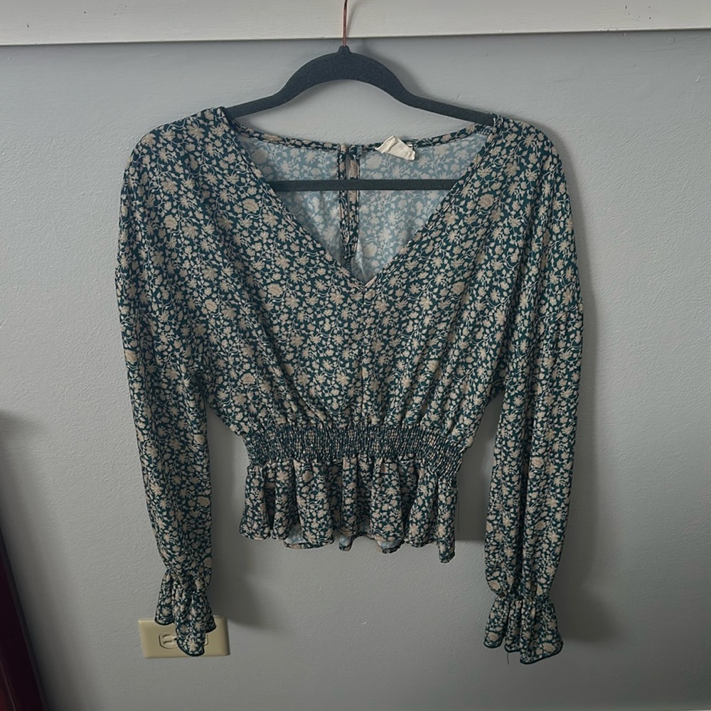 Long sleeve slightly cropped plum style shirt